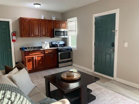 Kitchen or kitchenette, Living room, Photo of the whole room, Seating area, microwave, stove