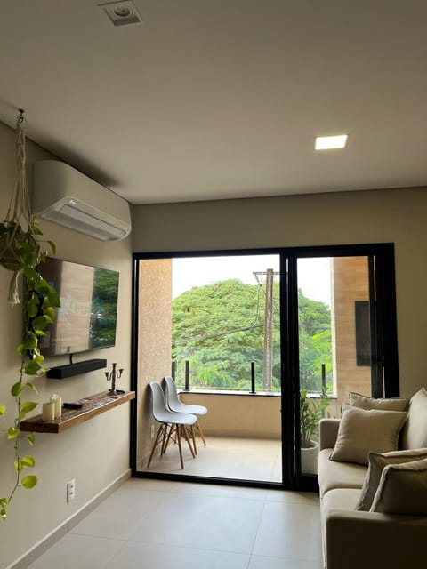 Communal lounge/ TV room, TV and multimedia, Living room, Seating area, air conditioner