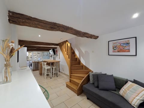 Living room, Decorative detail, City view, furniture, heating, storage, stove, toaster, washing machine, kitchen
