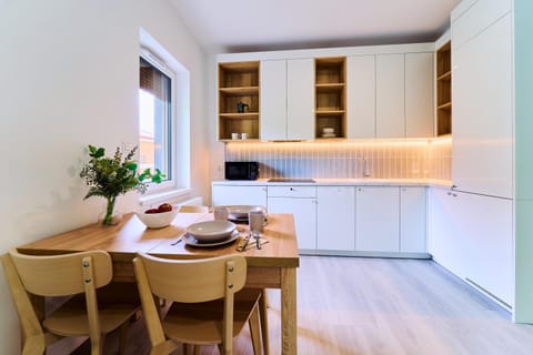 Kitchen or kitchenette, Dining area, dishwasher, microwave, stove
