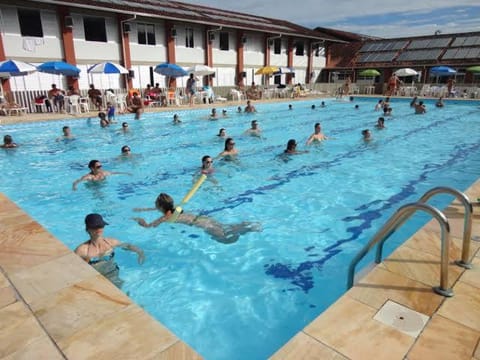 People, Pool view, Swimming pool, sunbed