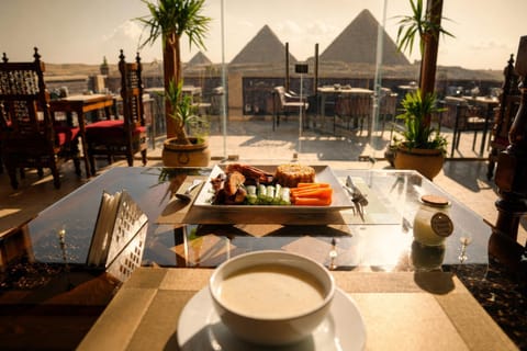 Restaurant/places to eat, View (from property/room), Balcony/Terrace, Food, Landmark view, Mountain view