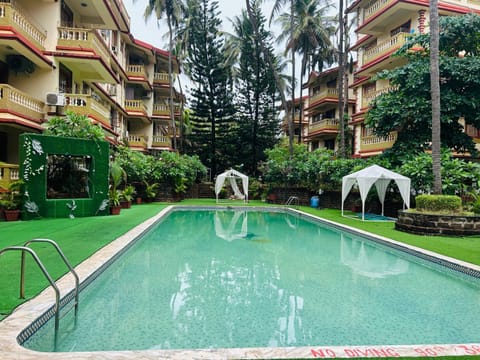 Property building, Spring, Day, Natural landscape, Garden, Garden view, Pool view, Swimming pool