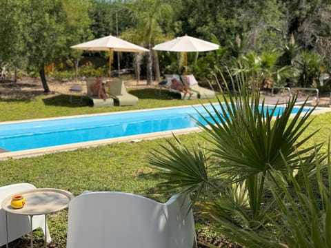 Natural landscape, Garden, Garden view, Pool view, Swimming pool, sunbed
