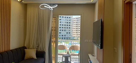 TV and multimedia, Balcony/Terrace, Living room, Seating area, air conditioner