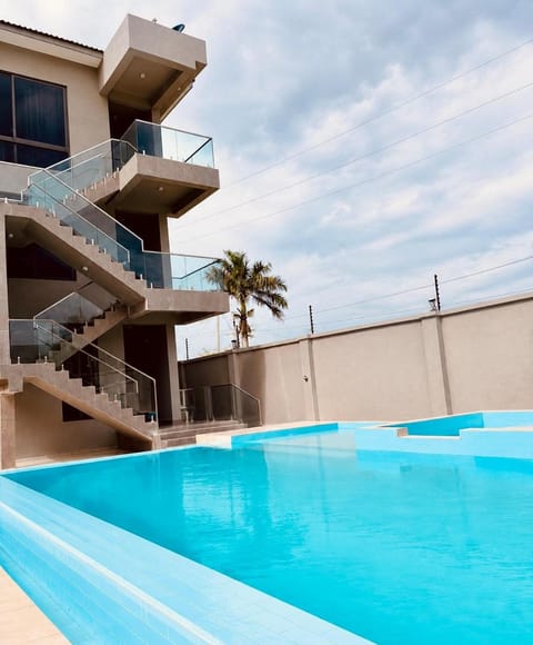 Property building, Day, Pool view, Swimming pool
