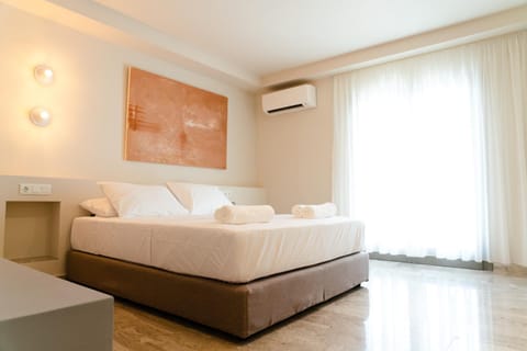 Bed, Balcony/Terrace, Decorative detail, towels, air conditioner