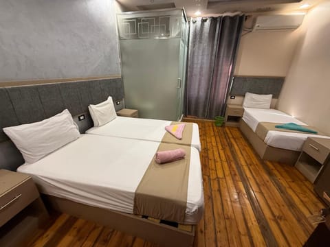 Bed, Photo of the whole room, Bedroom, towels, air conditioner