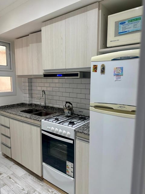 Kitchen or kitchenette, oven, stove