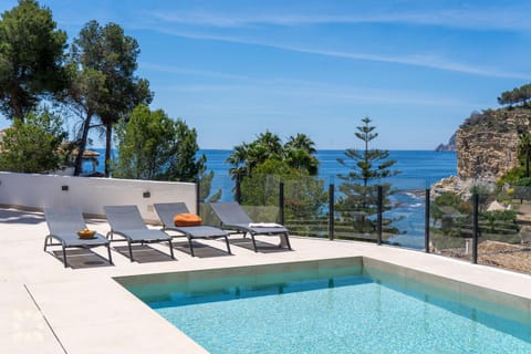 Patio, Day, Natural landscape, Living room, Seating area, Pool view, Sea view, Swimming pool, sunbed