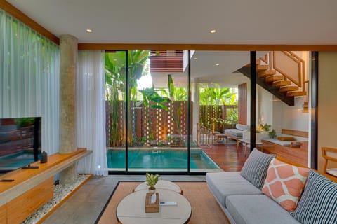 Living room, Seating area, Pool view, Swimming pool