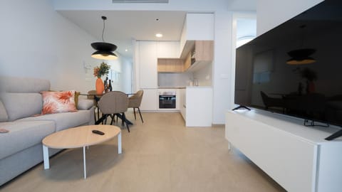 TV and multimedia, Kitchen or kitchenette, Living room, Seating area, Dining area, dishwasher, oven, stove