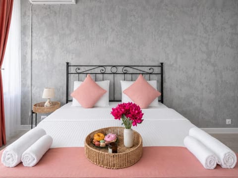 Bed, Photo of the whole room, Bedroom, towels, air conditioner