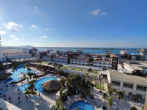 Property building, Nearby landmark, Day, Natural landscape, Bird's eye view, Beach, City view, Pool view, Sea view, Swimming pool, sunbed