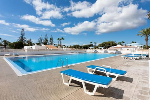 Property building, Living room, Swimming pool