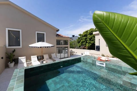 Property building, Patio, Garden, Pool view, Swimming pool, sunbed