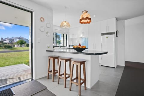 Kitchen or kitchenette, dishwasher, oven, stove