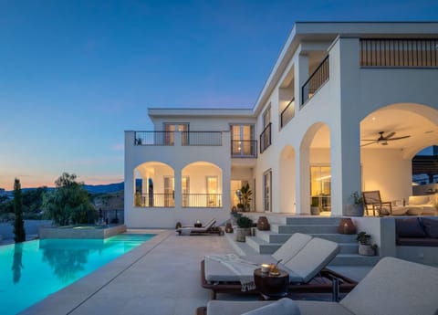 Property building, Patio, Natural landscape, View (from property/room), Balcony/Terrace, Seating area, Pool view, Swimming pool, sunbed