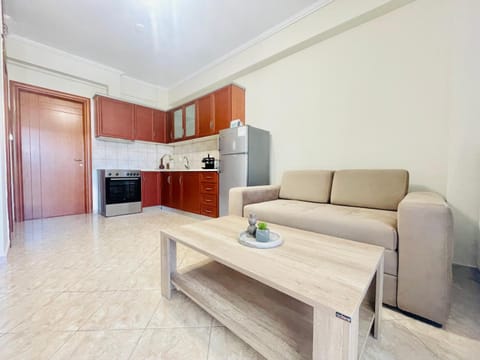 Kitchen or kitchenette, Living room, Seating area, oven, stove