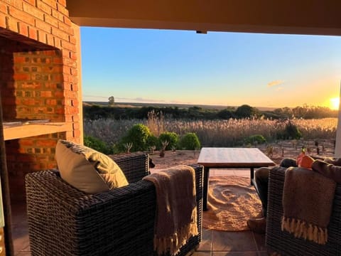 Property building, Patio, Day, Natural landscape, BBQ facilities, View (from property/room), Balcony/Terrace, Seating area, Sunset