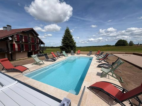 Property building, Living room, Swimming pool
