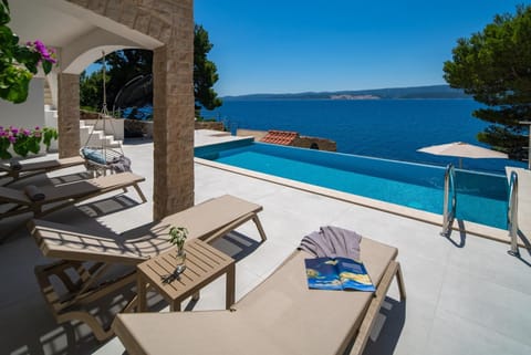 Day, Natural landscape, Balcony/Terrace, Seating area, Pool view, Sea view, Swimming pool, sunbed