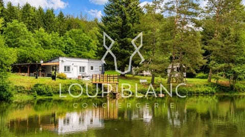 Property building, Property logo or sign, Natural landscape, Lake view