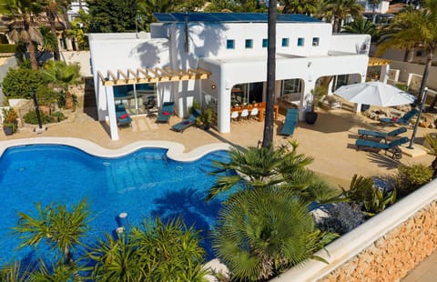 Property building, Living room, Swimming pool