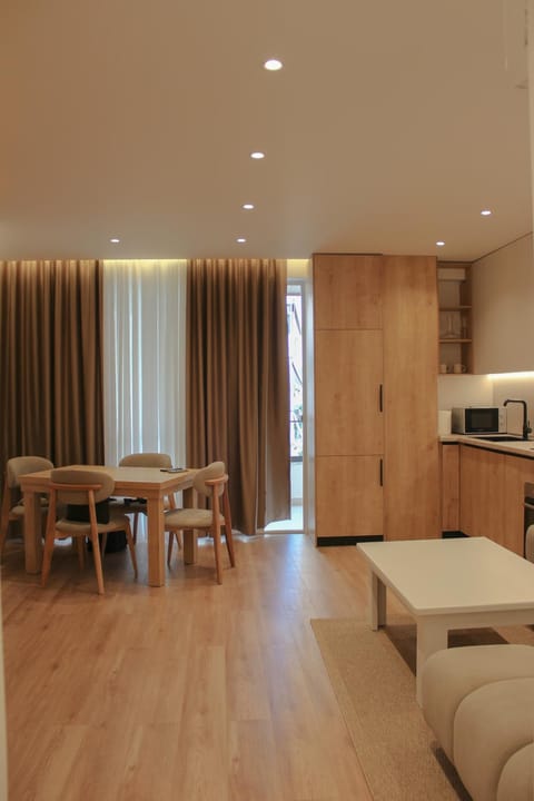Kitchen or kitchenette, Living room, Seating area, Dining area