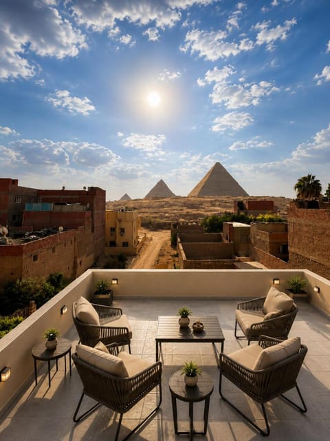 Property building, Patio, Nearby landmark, Day, Natural landscape, View (from property/room), Balcony/Terrace, Living room, Seating area, Mountain view