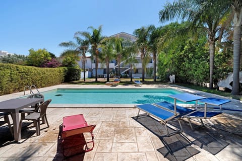 Property building, Living room, Swimming pool