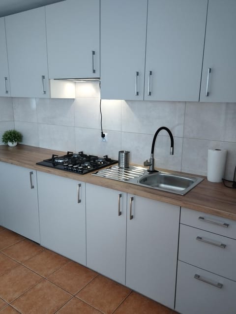Kitchen or kitchenette, stove