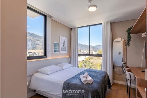 Bed, Seating area, Bedroom, Mountain view
