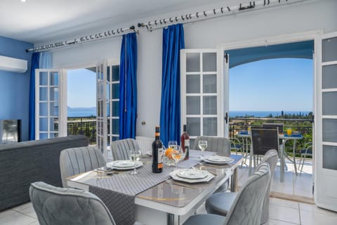 Natural landscape, Living room, Seating area, Dining area, Sea view