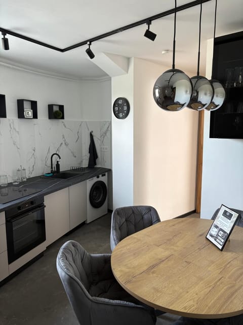 Kitchen or kitchenette, Seating area, Dining area, oven, stove, toaster