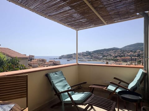Patio, View (from property/room), Seating area, Mountain view, Sea view