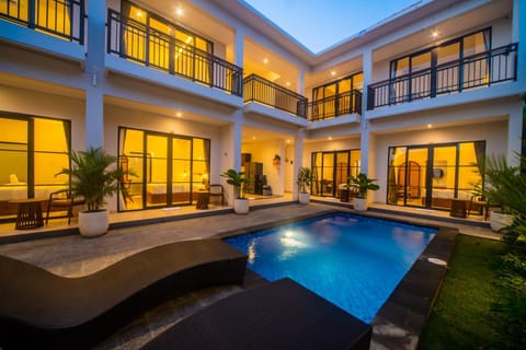 Property building, Patio, Pool view, Swimming pool, sunbed