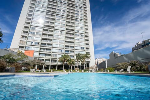 Property building, Off site, Day, City view, Pool view, Swimming pool, sunbed