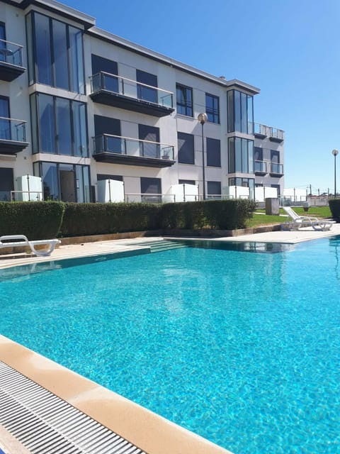 Property building, Living room, Swimming pool