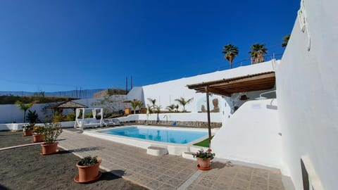 Property building, Living room, Swimming pool