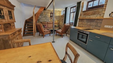 Kitchen or kitchenette, Living room, Seating area, Dining area