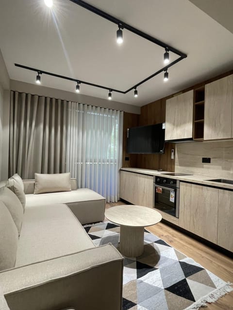 Kitchen or kitchenette, Living room, Seating area, minibar, oven