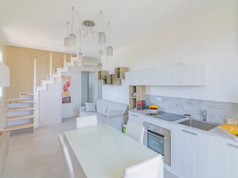 Kitchen or kitchenette, oven, stove