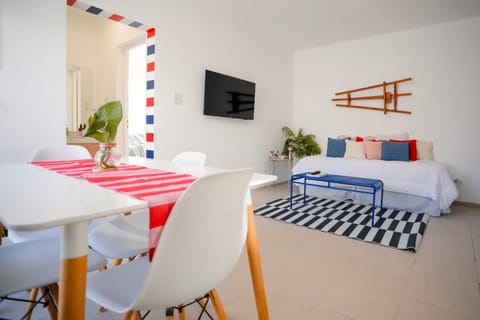 Bed, TV and multimedia, Living room, Seating area, Dining area
