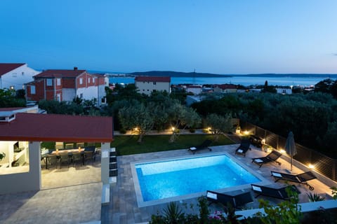 Patio, Day, Natural landscape, Pool view, Sea view, Swimming pool, sunbed