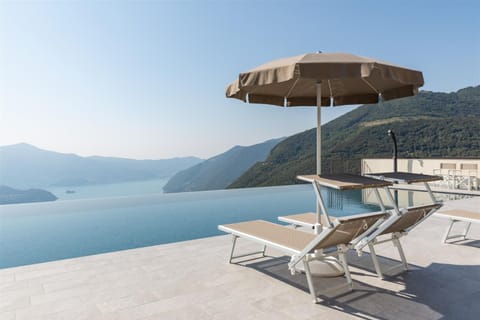 Day, Natural landscape, Lake view, Mountain view, Pool view, Swimming pool, sunbed