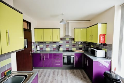 Kitchen or kitchenette, oven, stove, toaster
