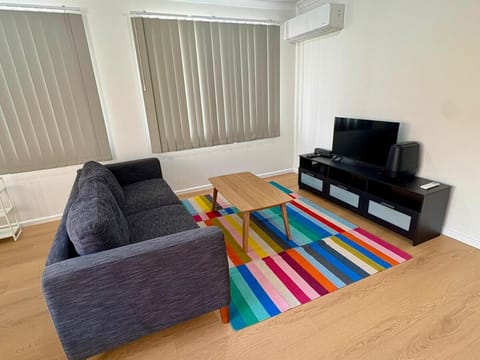 Communal lounge/ TV room, Living room, Seating area, air conditioner