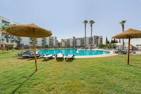 Property building, Living room, Swimming pool