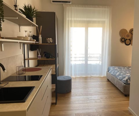 Bed, Kitchen or kitchenette, Living room, Photo of the whole room, Seating area, Bedroom, air conditioner